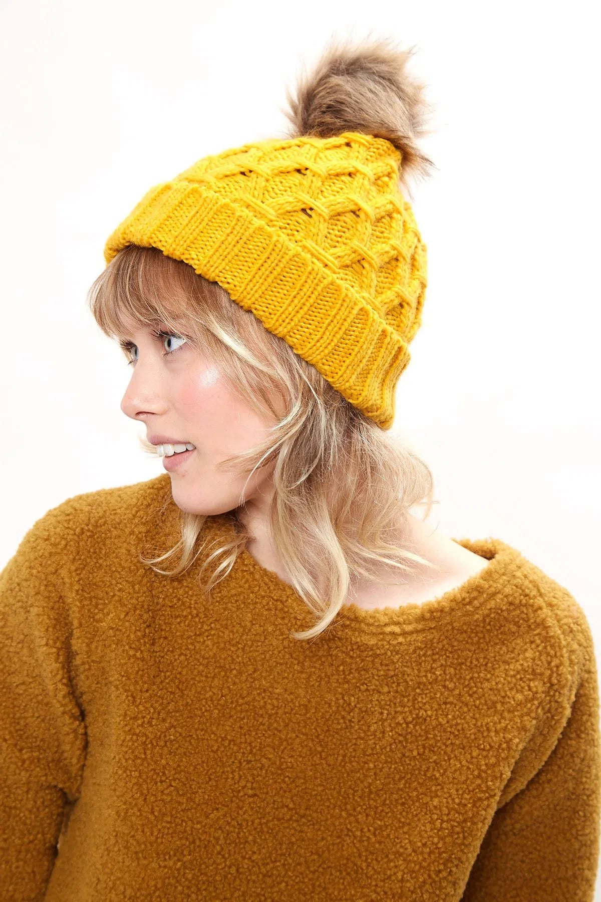 Louche Shauna Cable Knitted Beanie With Faux Fur Bobble - Mustard