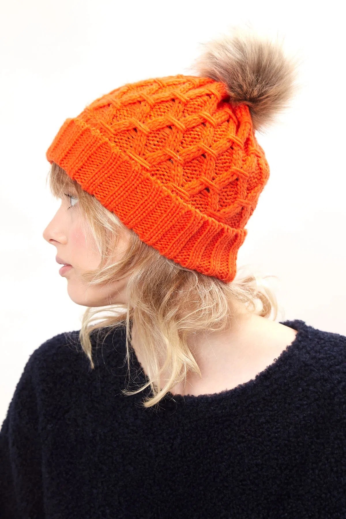 Louche Shauna Cable Knitted Beanie With Faux Fur Bobble - Red - Detail 1