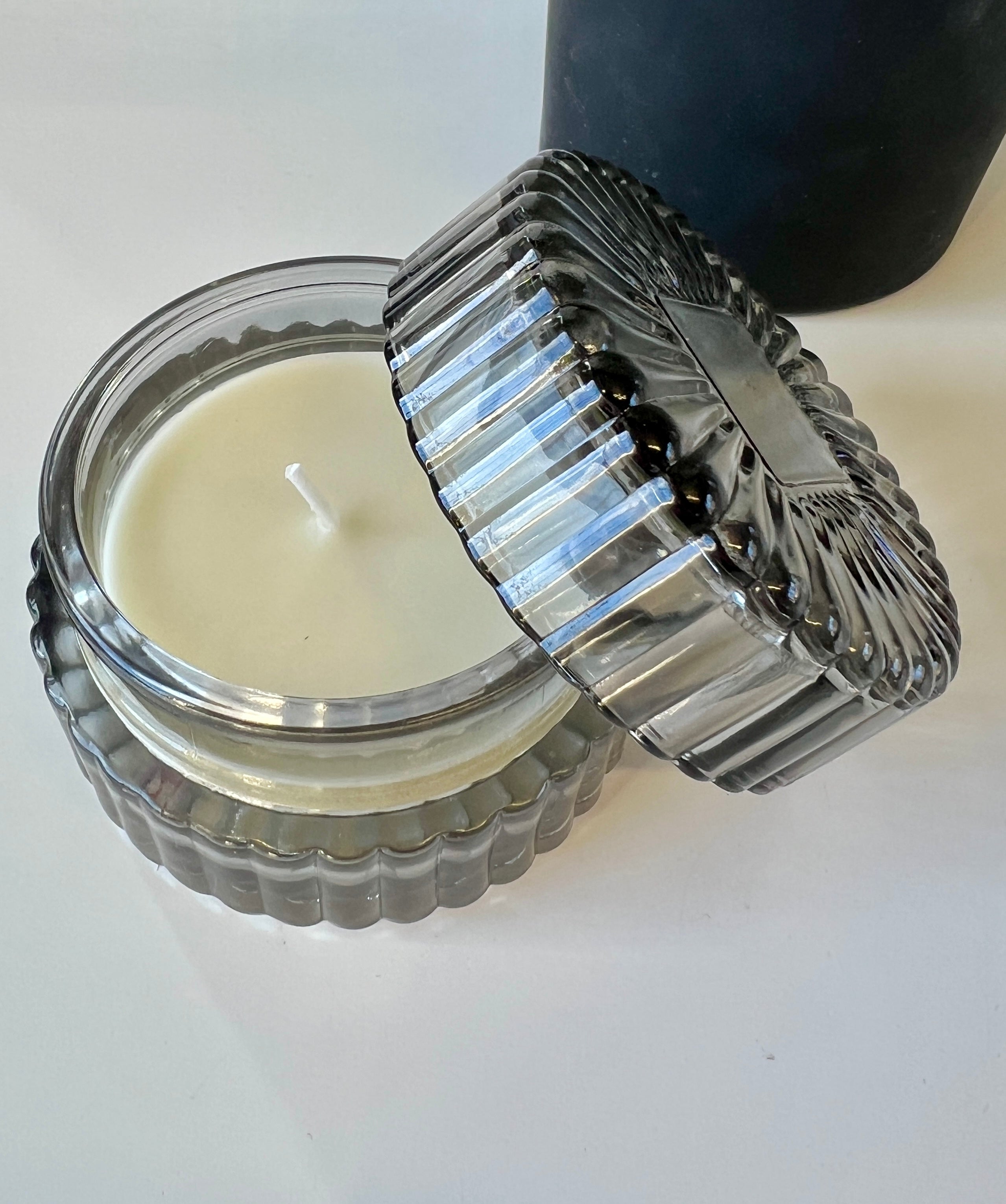 Patchouli and Sandalwood Scented Glass Candle - Styled