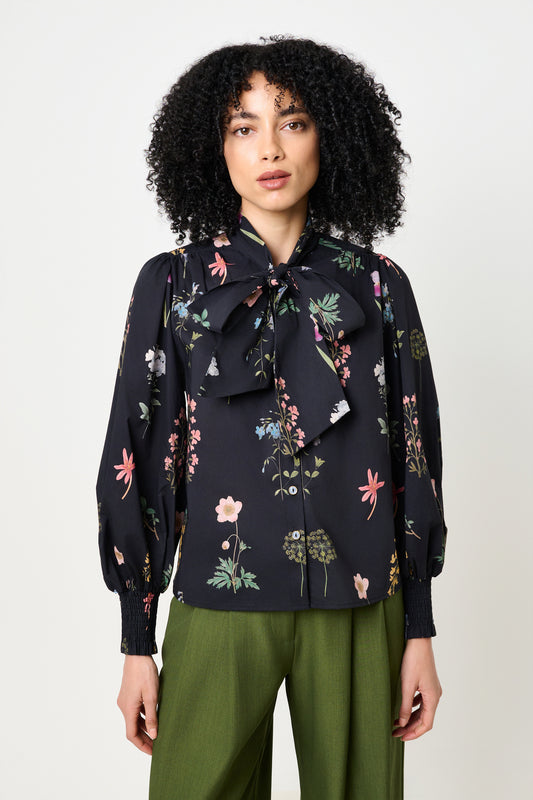 Aditi Flower Press Print Tie Neck Blouse