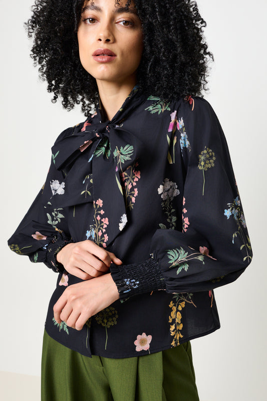 Aditi Flower Press Print Tie Neck Blouse
