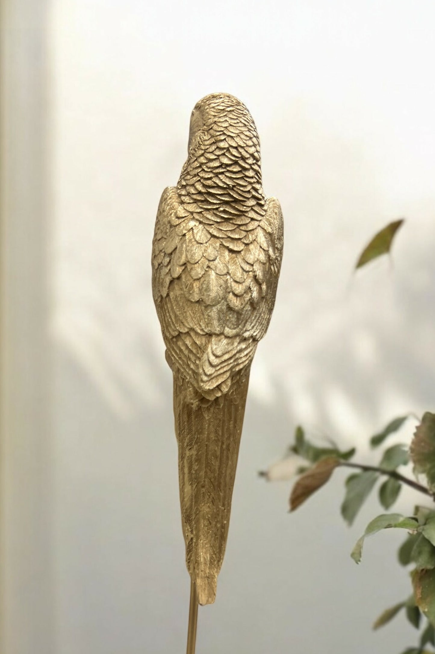 Gold Parrot on Stand