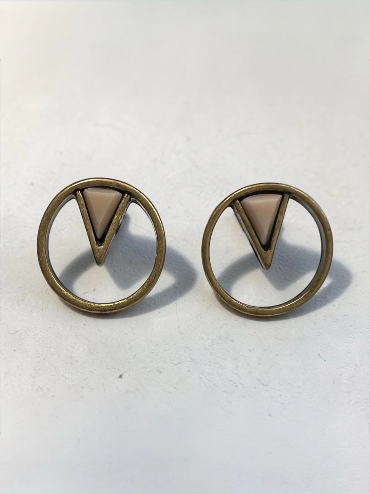 Antique brass V-insert stud earrings with blush resin detail by Louche — 1.5cm circle studs