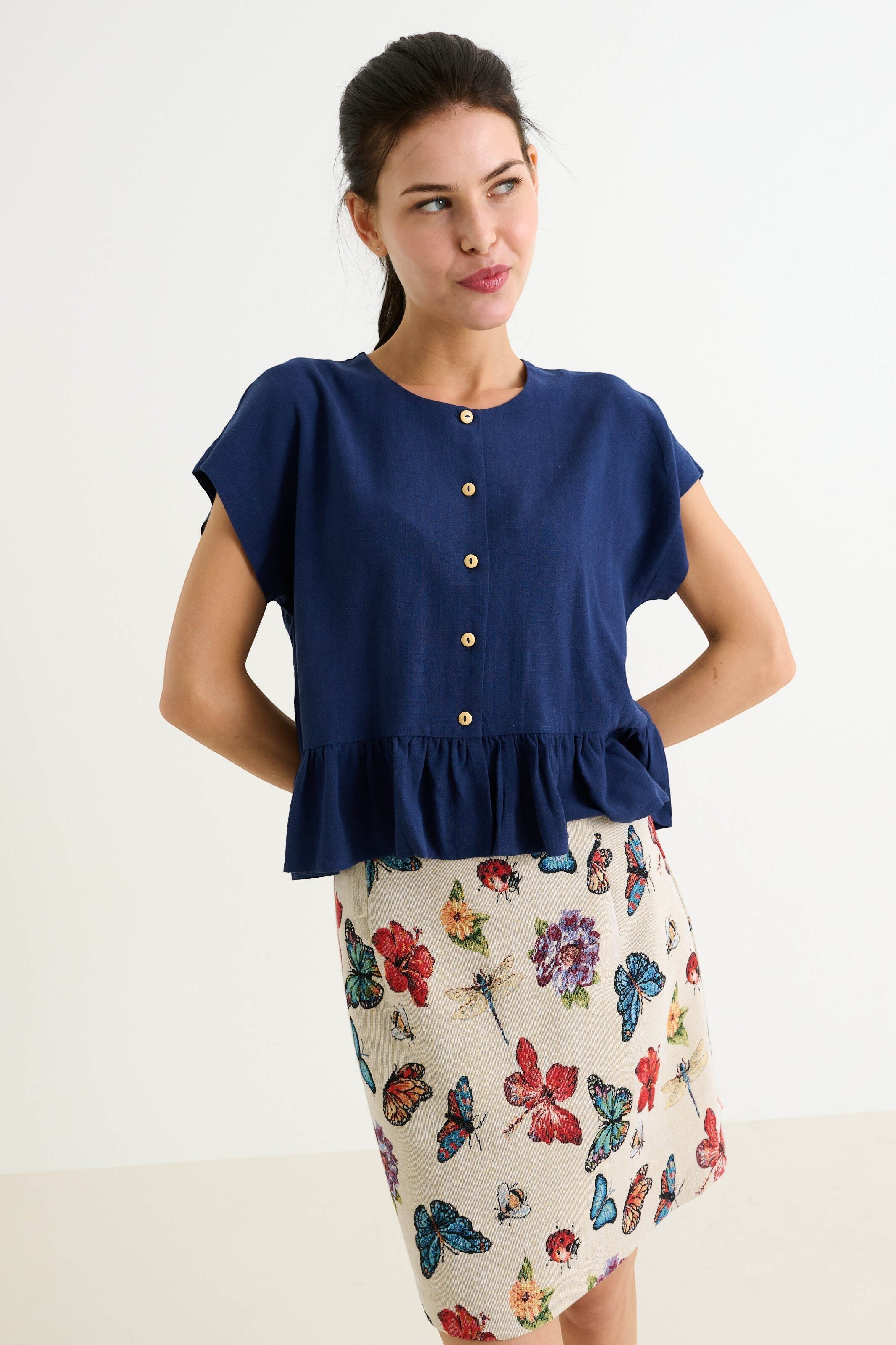 navy blue linen blend short sleeve top with button front and frill hem