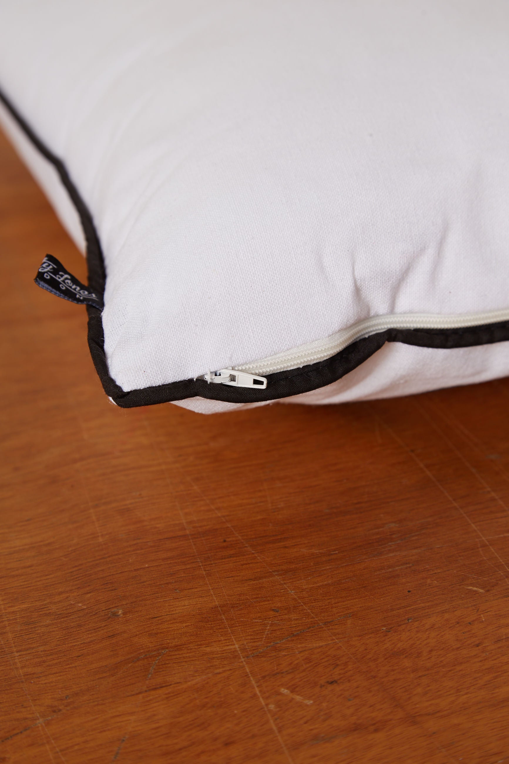 Closed Eye Face Print Cushion - Detail 1